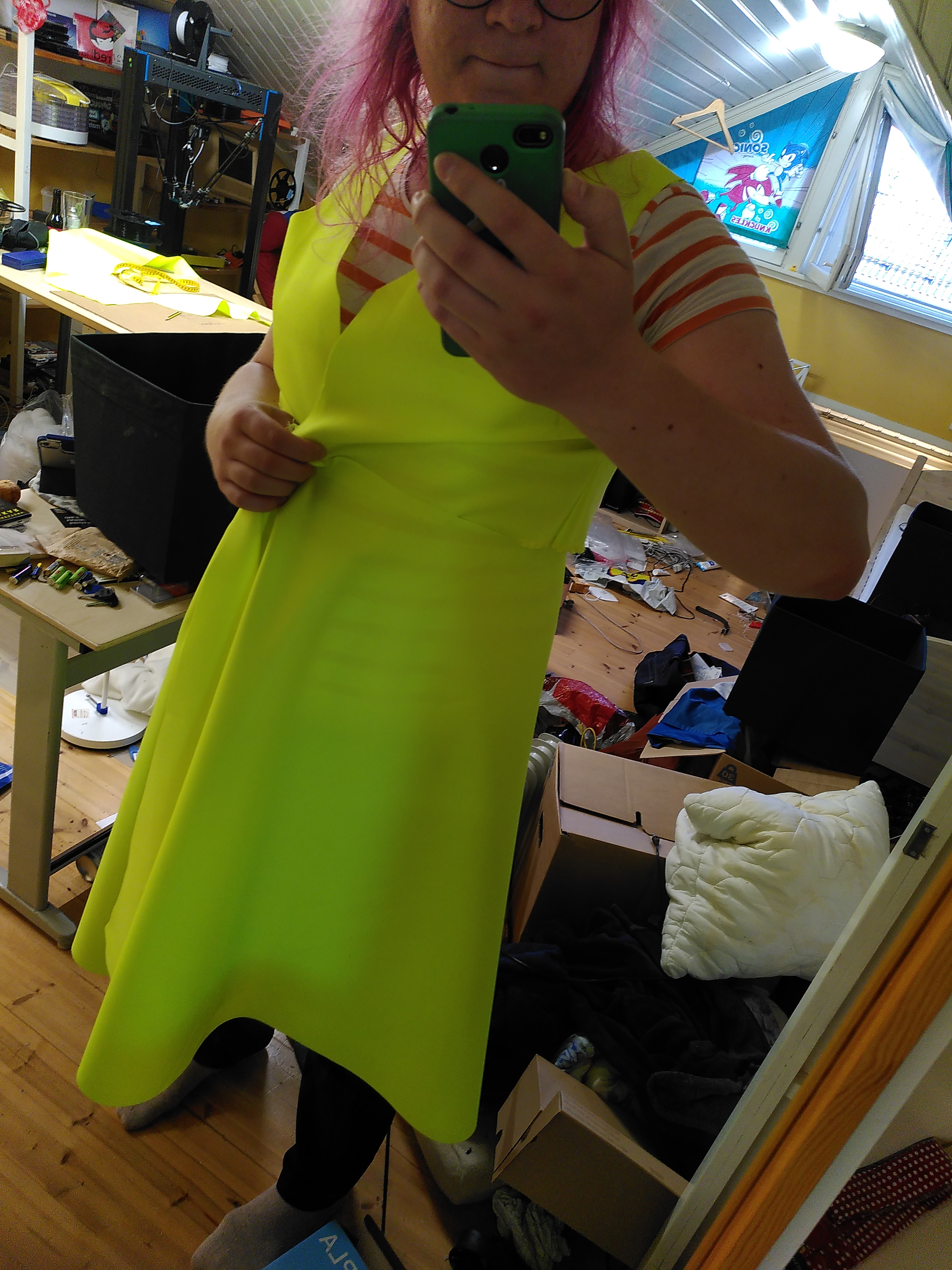 Photo of me wearing half-finished dress, currently mostly sewn together